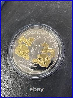 The Highland Mint Sports Collection Super Bowl 35 2-tone. 999 Silver Commem Coin